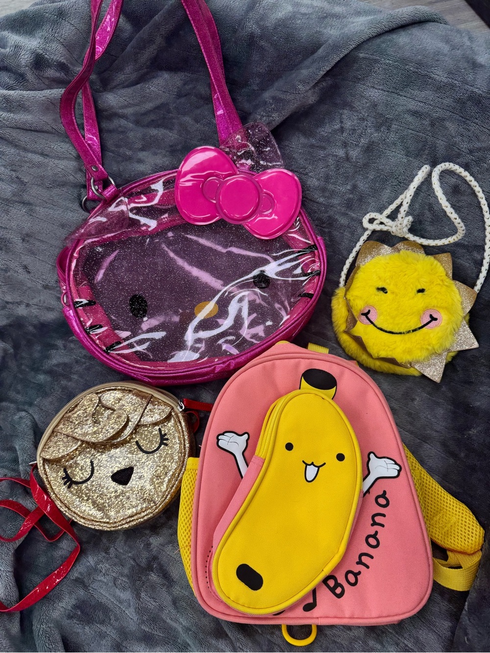 Mixed kids bags. Hello kitty, banana, sun, reindeer